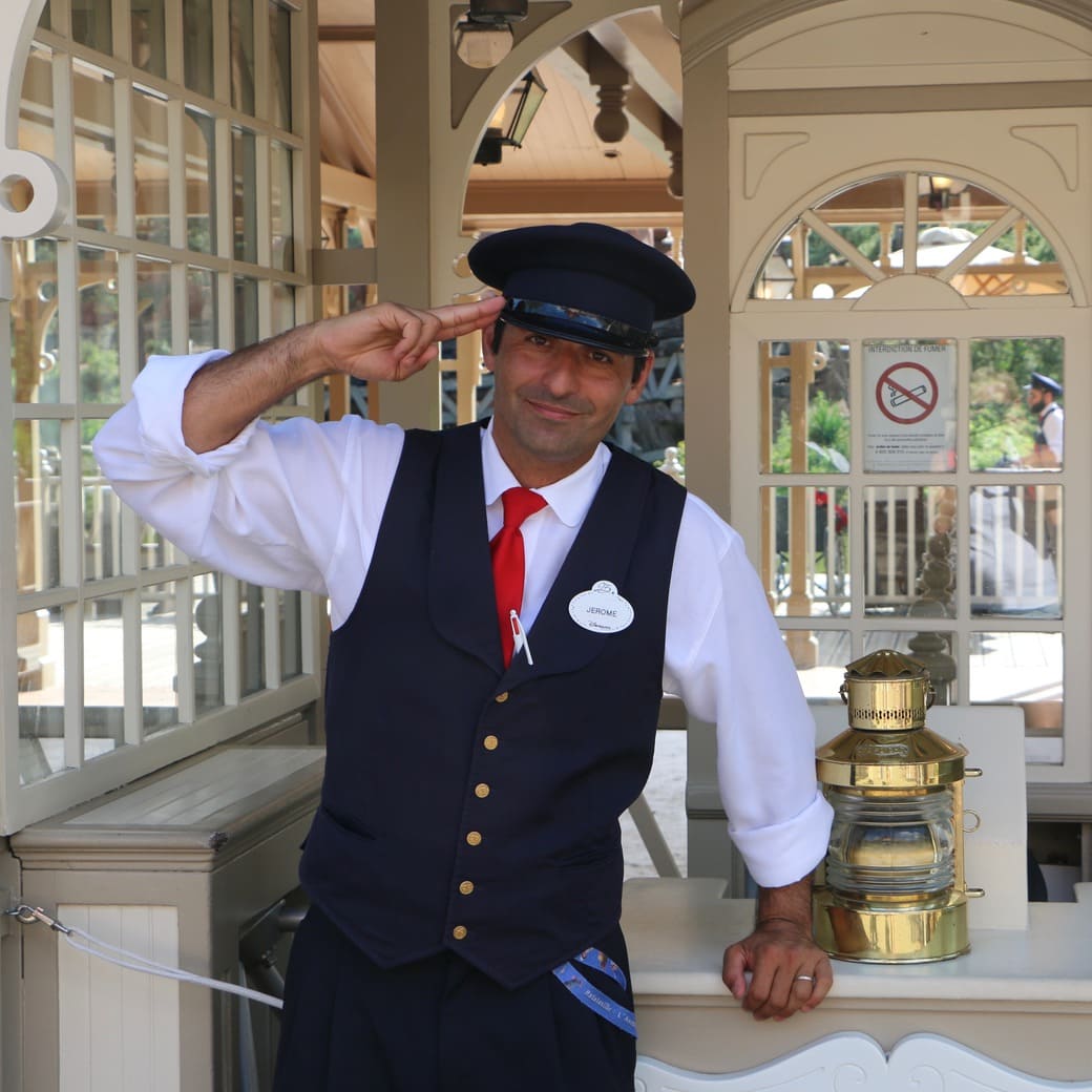 Welcome to Disneyland Image of Disney staff