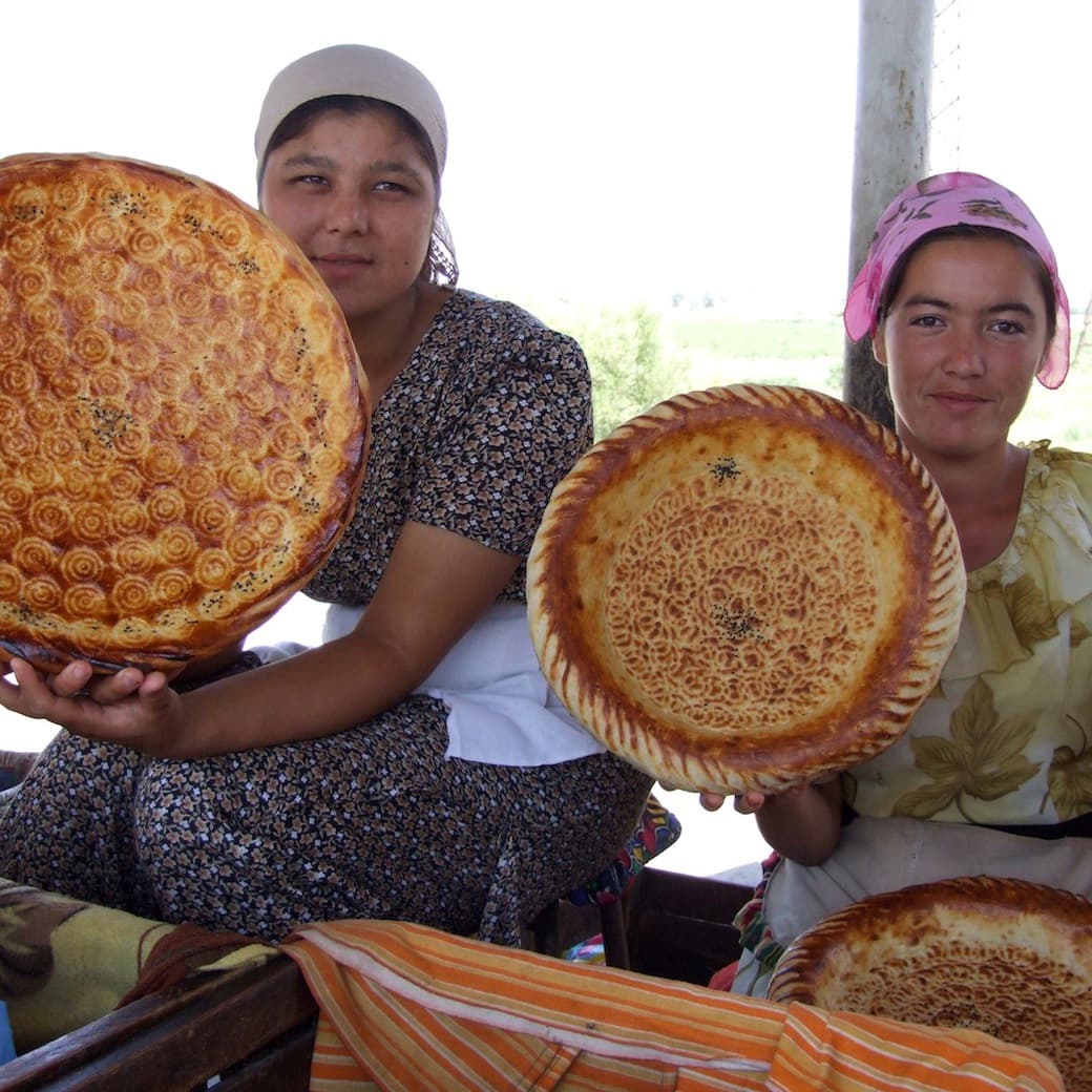 Selling bread Uzbek women selling bread