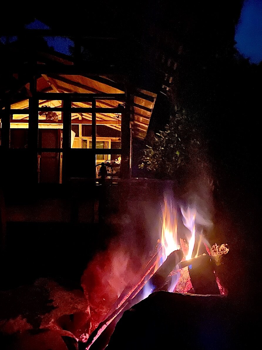 By the camp fire Airbnb at night